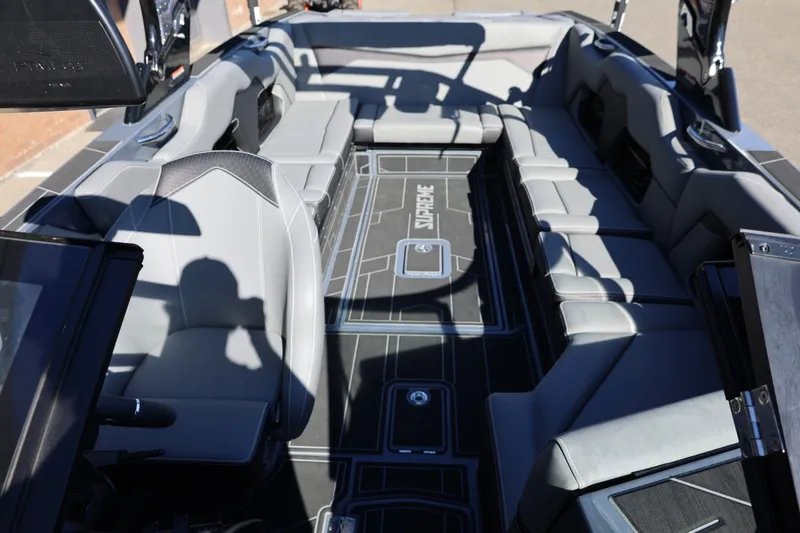 Slide: The Image of 2022 Supreme ZS252 boat interior with sleek gray seating and modern design. - 62