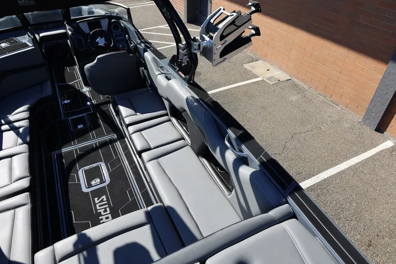 Slide: The Image of 2022 Supreme ZS252 boat interior with sleek seating and modern dashboard design. - 28