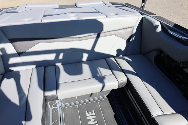 Slide: The Image of 2022 Supreme ZS252 boat interior with gray seating and shadow patterns. - 32