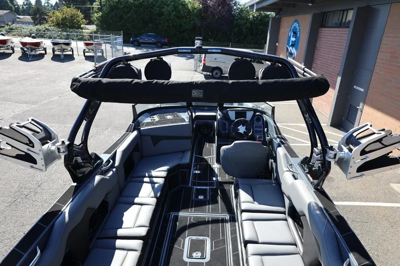 Slide: The Image of 2022 Supreme ZS252 boat interior with sleek seating and advanced dashboard features. - 26