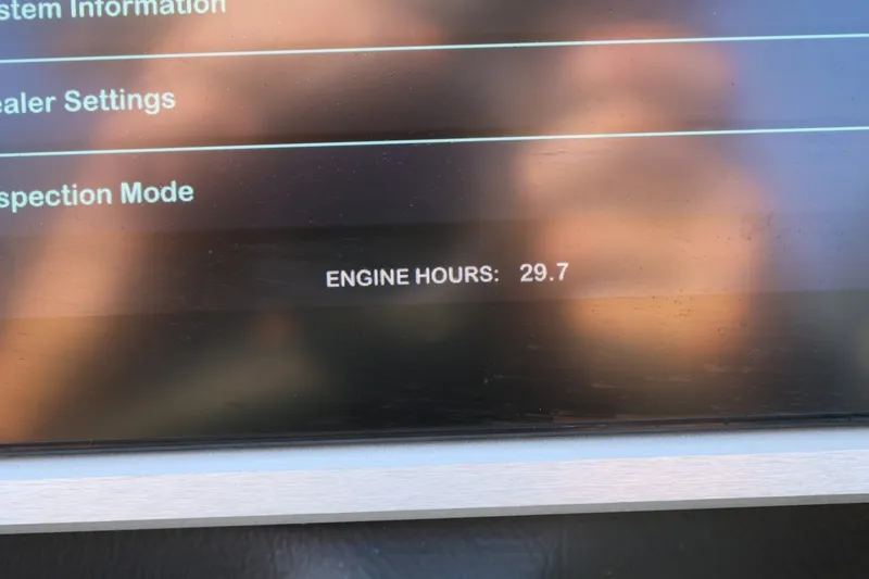 Slide: The Image of Display screen showing engine hours at 29.7 for 2022 Supreme ZS252. - 50
