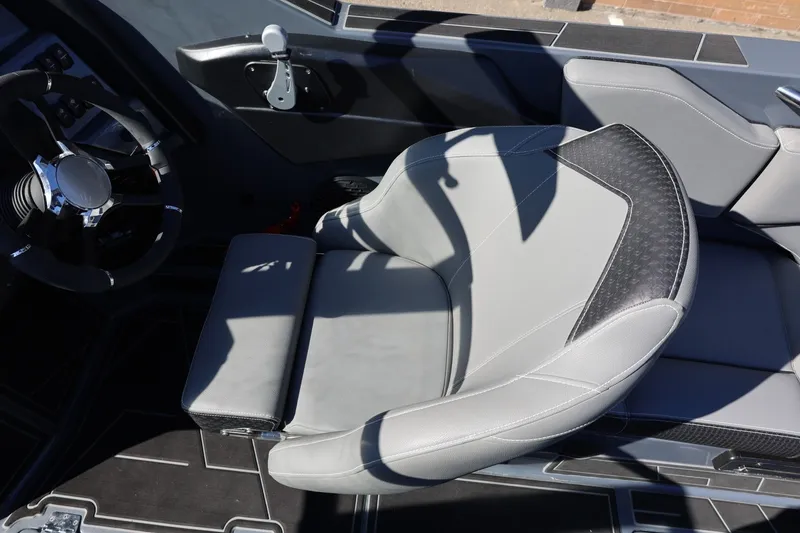 Slide: The Image of 2022 Supreme ZS252 boat interior with sleek steering wheel and modern seating design. - 45