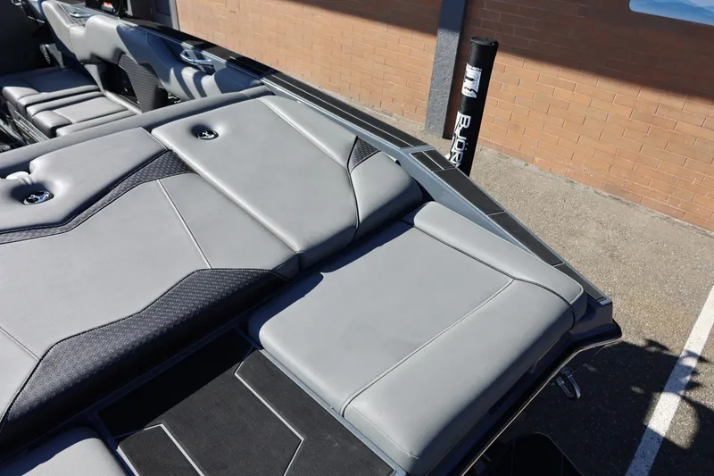 Slide: The Image of 2022 Supreme ZS252 boat interior with sleek gray seating and modern design. - 17