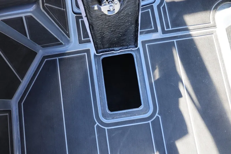 Slide: The Image of 2022 Supreme ZS252 boat interior flooring with storage compartment. - 42