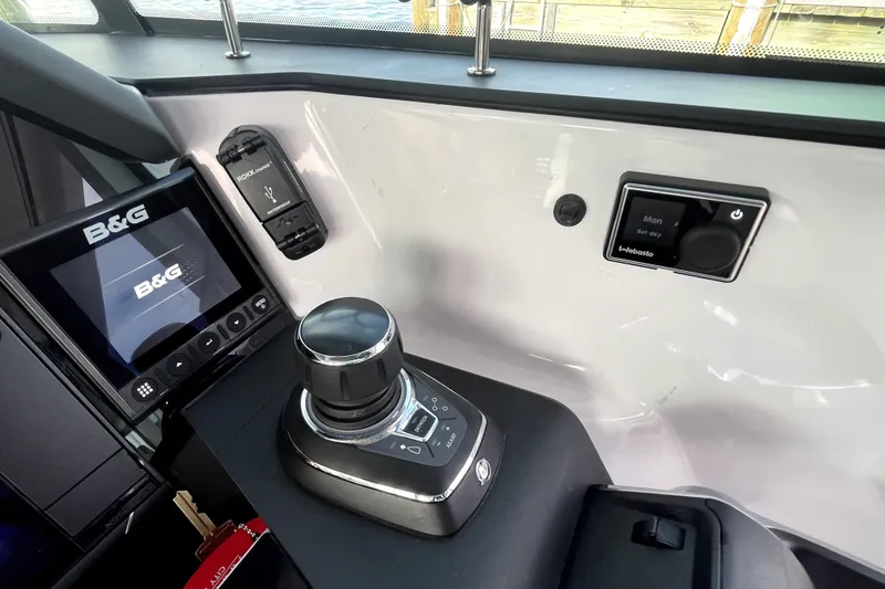 Slide: The Image of Control panel of 2023 Axopar 37 XC Cross Cabin with B&G display and joystick. - 17