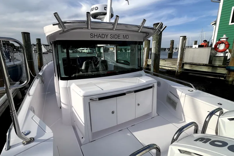 Slide: The Image of 2023 Axopar 37 XC Cross Cabin boat docked at Shady Side, MD marina. - 33