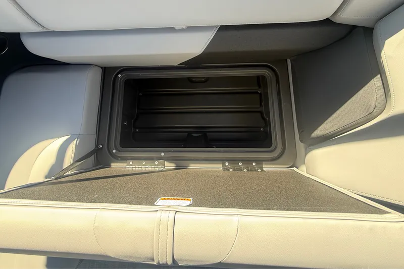 Slide: The Image of Open storage compartment in 2027 Sun Tracker SportFish 20 DLX boat. - 40
