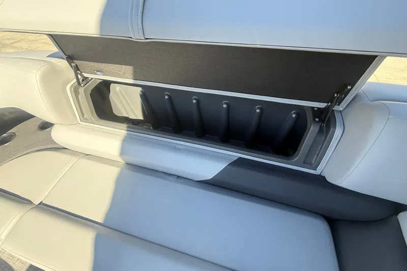 Slide: The Image of Sun Tracker SportFish 20 DLX 2027 boat seat storage compartment, open and empty. - 48