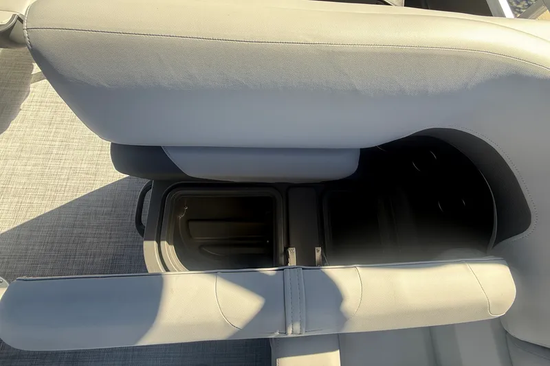 Slide: The Image of Sun Tracker SportFish 20 DLX 2027 boat seat with integrated storage compartment. - 32