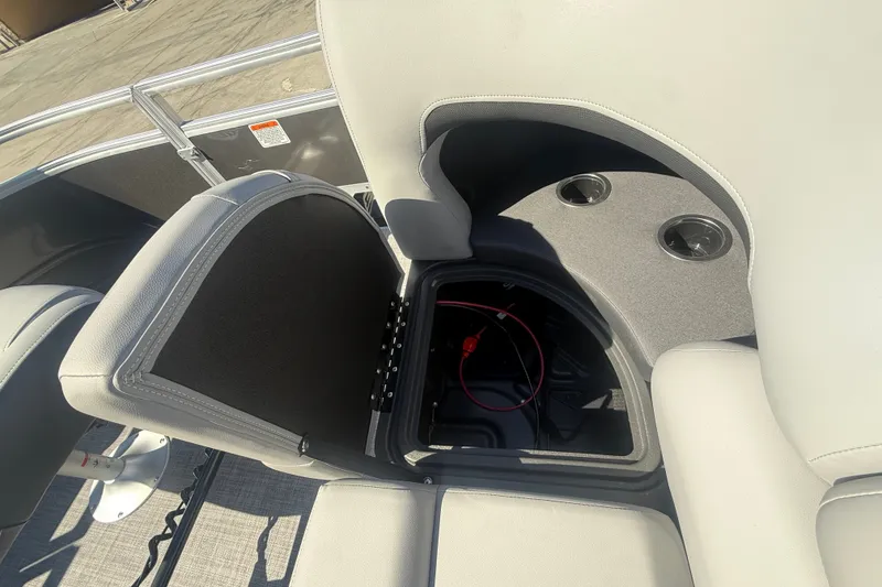Slide: The Image of 2027 Sun Tracker SportFish 20 DLX boat seat storage with cup holders and wiring. - 47