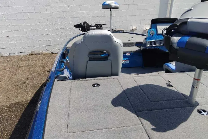 Slide: The Image of 2027 Nitro Z18 XL Pro boat interior with gray seating and blue accents. - 4