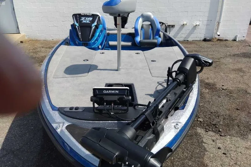 Slide: The Image of 2027 Nitro Z18 XL Pro boat with Garmin equipment, blue and gray design. - 7
