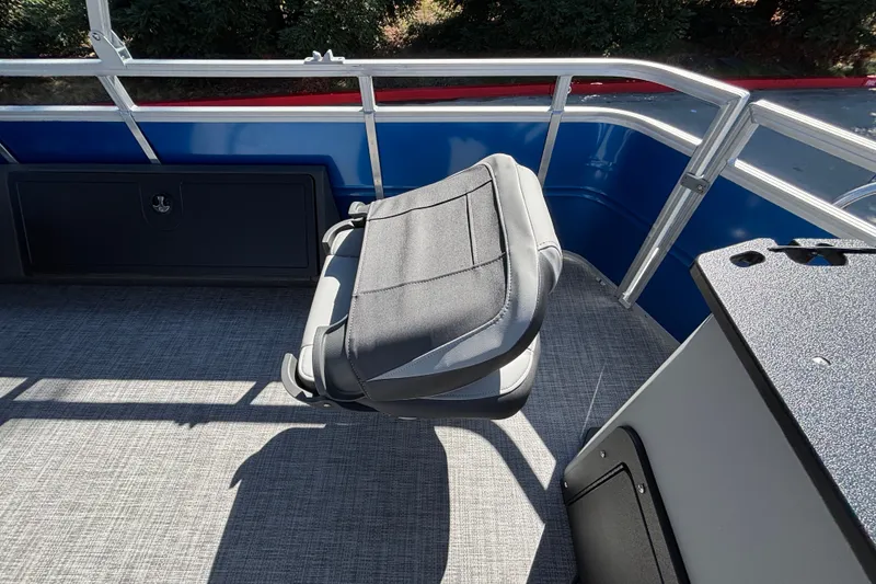 Slide: The Image of 2027 Sun Tracker SportFish 22 DLX boat interior with comfortable seating and sleek design. - 16