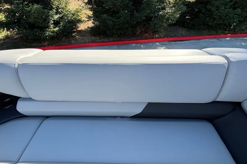 Slide: The Image of Sun Tracker SportFish 22 DLX 2027 boat seat with sleek white upholstery. - 27