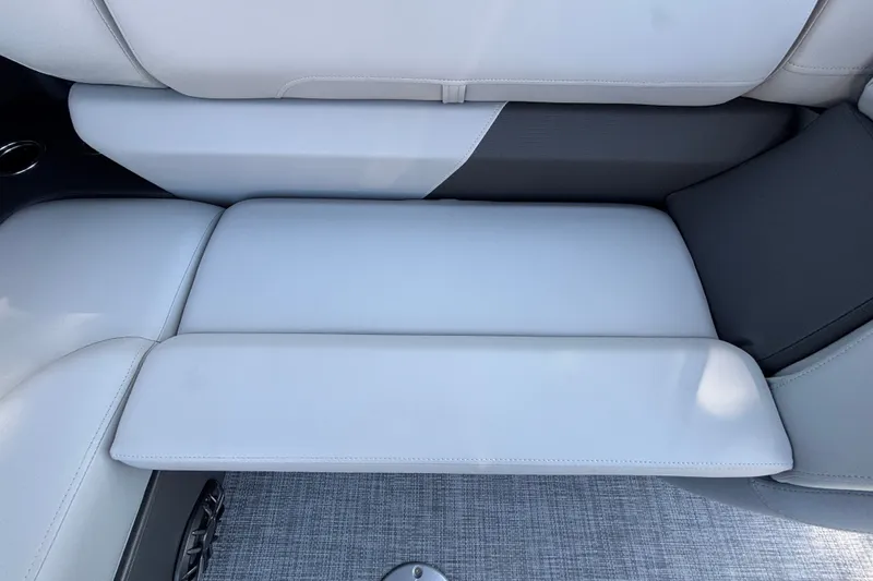 Slide: The Image of 2027 Sun Tracker SportFish 22 DLX boat interior with sleek, cushioned seating. - 44
