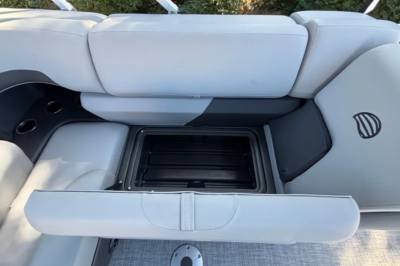 Slide: The Image of Sun Tracker SportFish 22 DLX 2027 boat seat with storage compartment and cup holders. - 47
