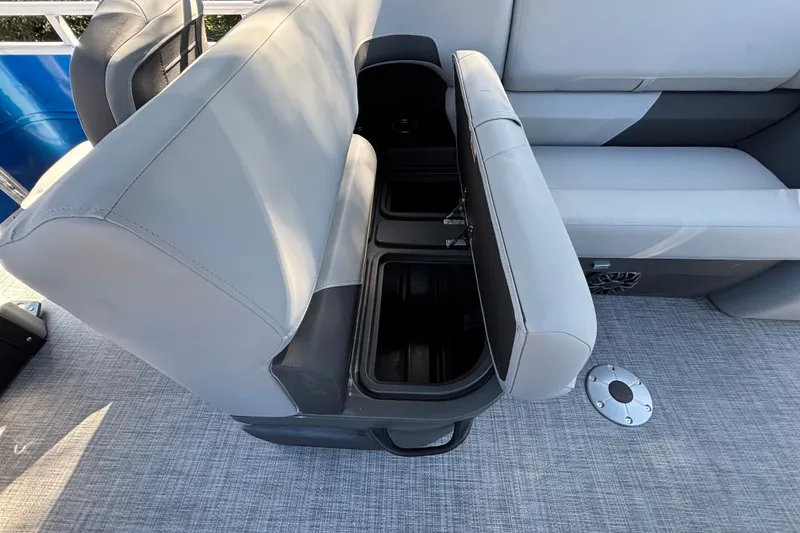 Slide: The Image of Sun Tracker SportFish 22 DLX 2027 boat seat with storage compartment open. - 40