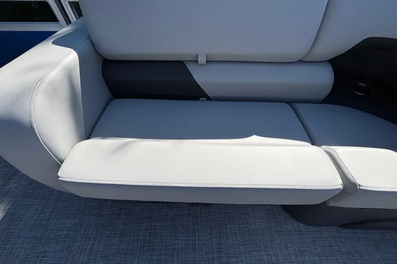 Slide: The Image of 2027 Sun Tracker SportFish 22 DLX boat seat, featuring sleek gray upholstery. - 51