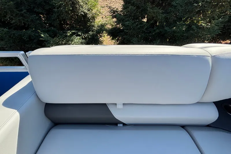 Slide: The Image of 2027 Sun Tracker SportFish 22 DLX boat seat with gray upholstery and cup holder. - 53