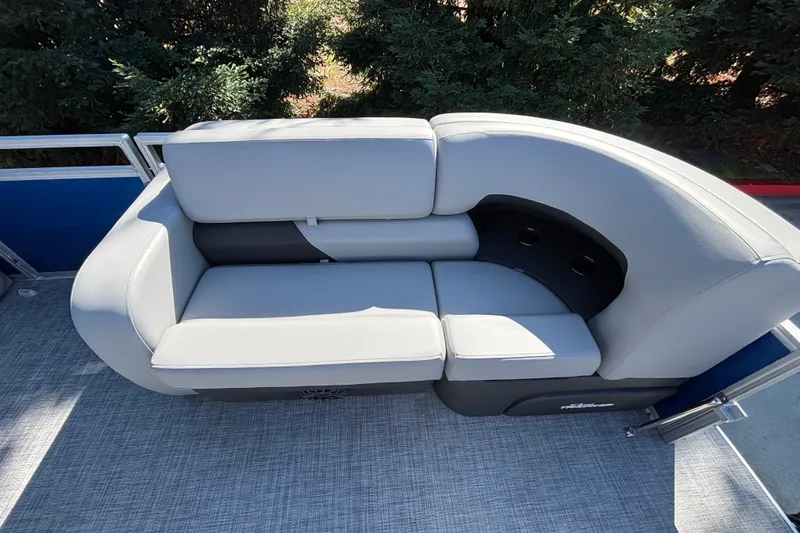 Slide: The Image of Luxurious seating on 2027 Sun Tracker SportFish 22 DLX pontoon boat, featuring sleek gray upholstery. - 56