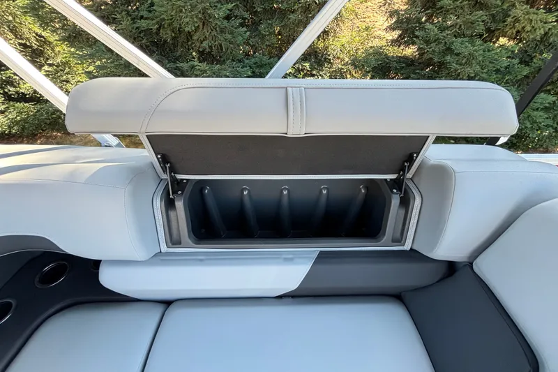 Slide: The Image of 2027 Sun Tracker SportFish 22 DLX boat seat with open storage compartment. - 42