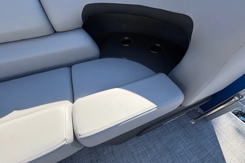 Slide: The Image of Sun Tracker SportFish 22 DLX 2027 boat seating with cup holders, gray upholstery. - 54