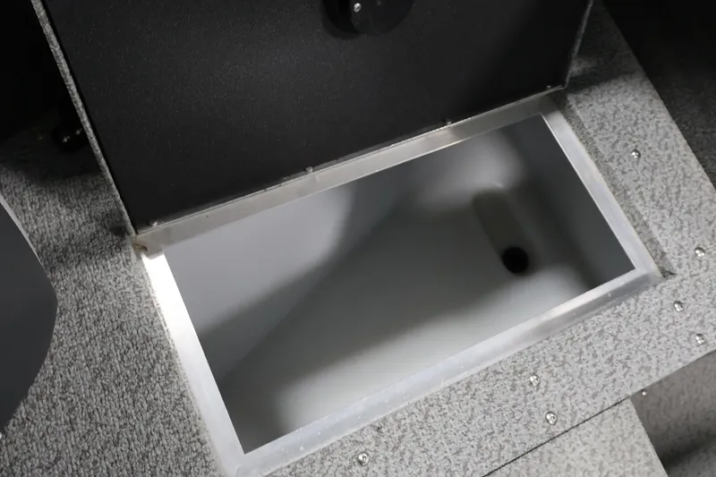 Slide: The Image of Open storage compartment in 2013 Lund 1750 Tyee boat, featuring a clean interior. - 20