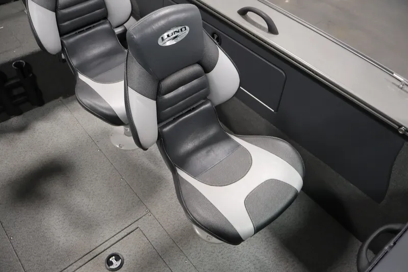 Slide: The Image of 2013 Lund 1750 Tyee boat interior with two cushioned seats. - 30