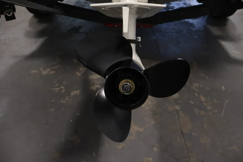 Slide: The Image of Propeller of 2013 Lund 1750 Tyee boat on a trailer in a garage. - 46