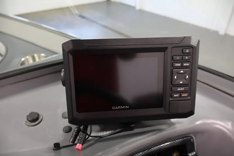 Slide: The Image of Garmin GPS device on 2013 Lund 1750 Tyee boat dashboard. - 58