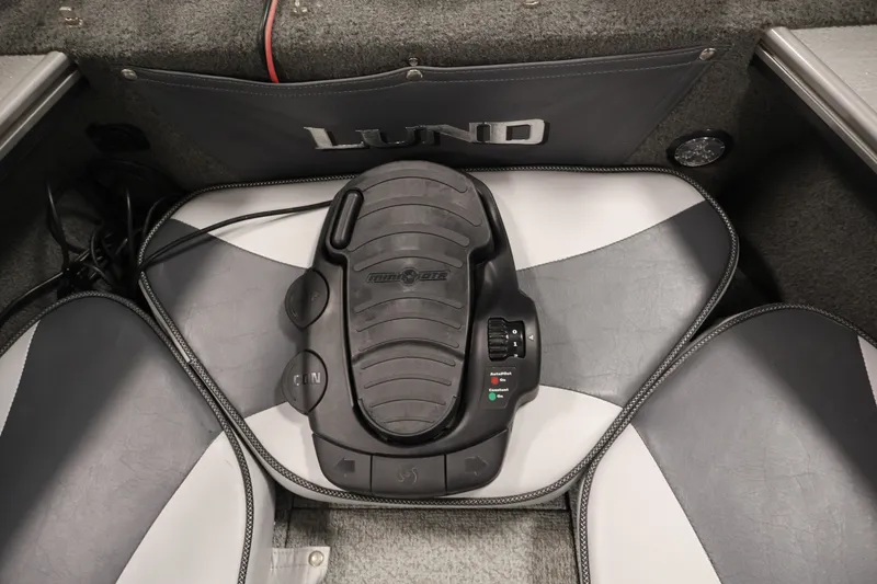 Slide: The Image of Foot pedal control in a 2013 Lund 1750 Tyee boat, featuring Minn Kota technology. - 14