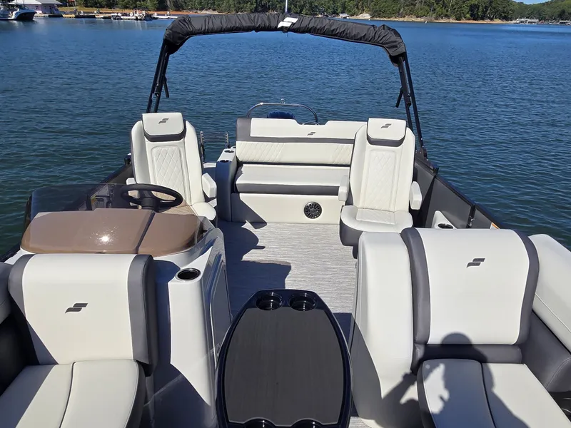 Slide: The Image of Starcraft EX 20 Q DH 2027: Spacious pontoon boat with luxurious seating and modern design. - 27