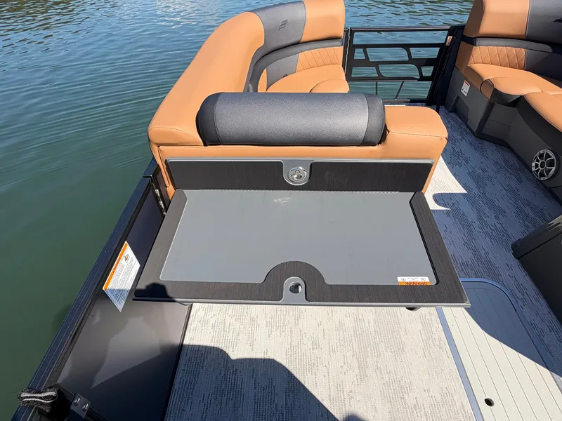 Slide: The Image of The image shows the rear of a 2027 Starcraft EXS 3 DL with a fold-out table. - 21