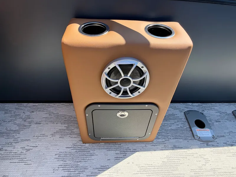 Slide: The Image of A speaker with two cup holders on a boat. - 15