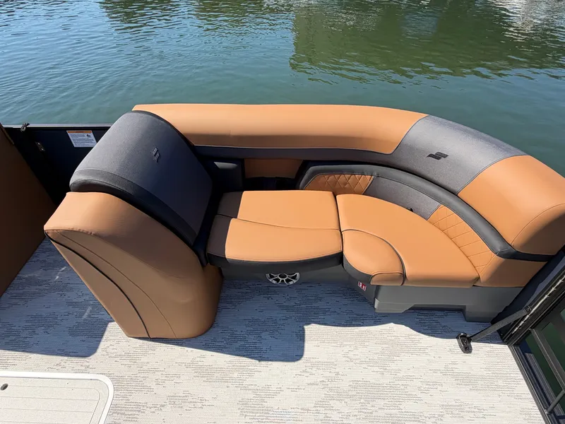 Slide: The Image of The image shows the luxurious seating of a 2027 Starcraft EXS 3 DL on a boat. - 29