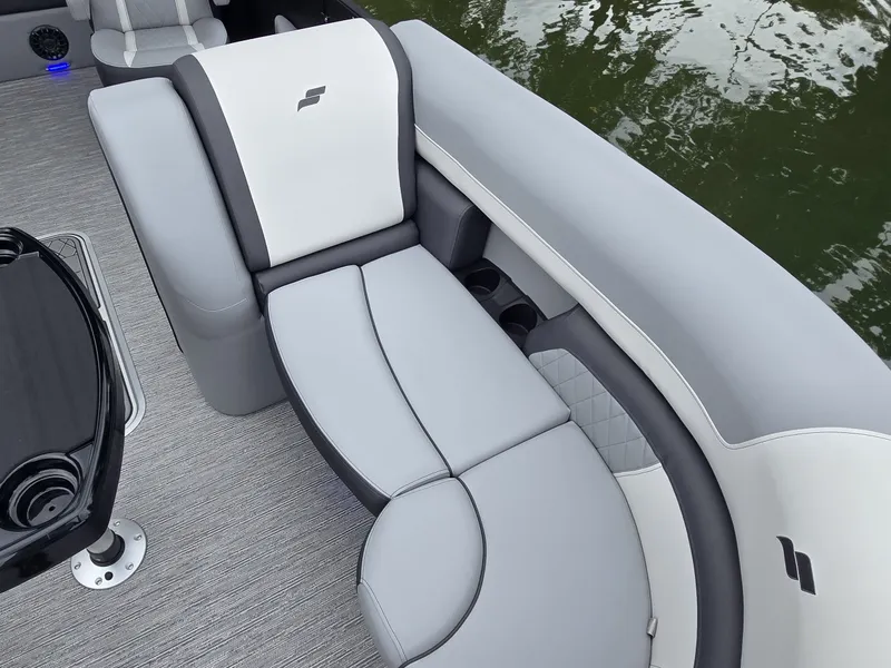 Slide: The Image of The image shows a modern boat seat with gray and white upholstery. - 27