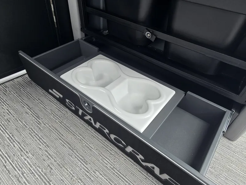 Slide: The Image of Starcraft EXS 3 Q DH 2027 with built-in cup holder in a drawer. - 21
