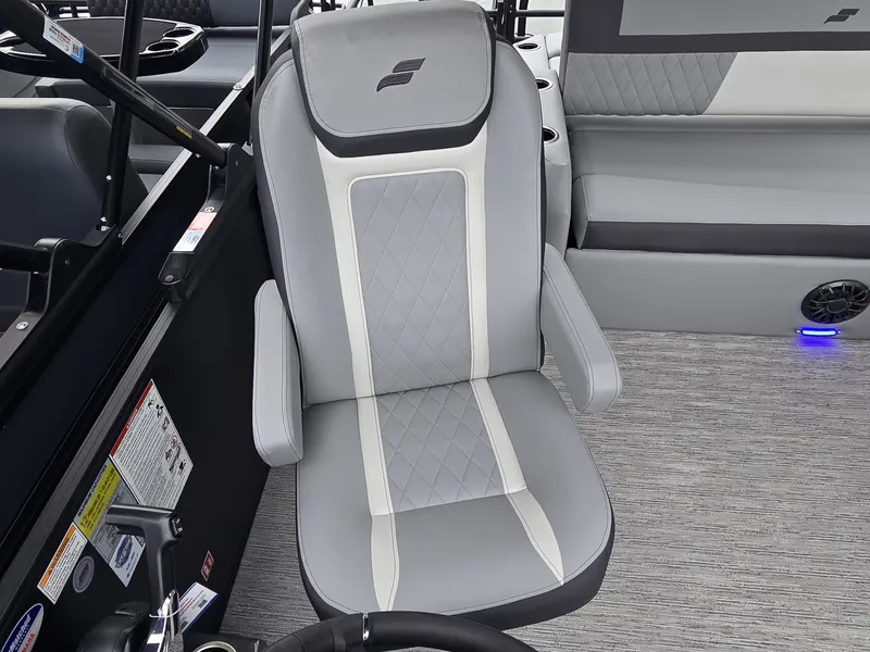 Slide: The Image of The 2027 Starcraft EXS 3 Q DH seat is gray with white accents and a quilted pattern. - 14