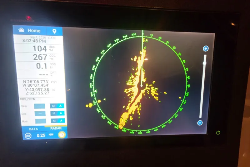 Slide: The Image of Radar display on a 1984 Bertram 54 Convertible boat, showing navigation data. - 82