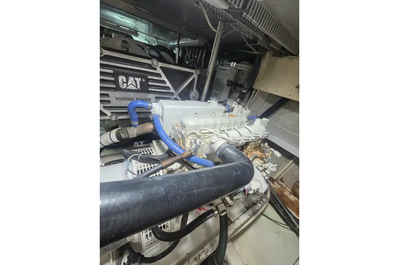 Slide: The Image of Engine room of a 1984 Bertram 54 Convertible with CAT marine power components. - 127