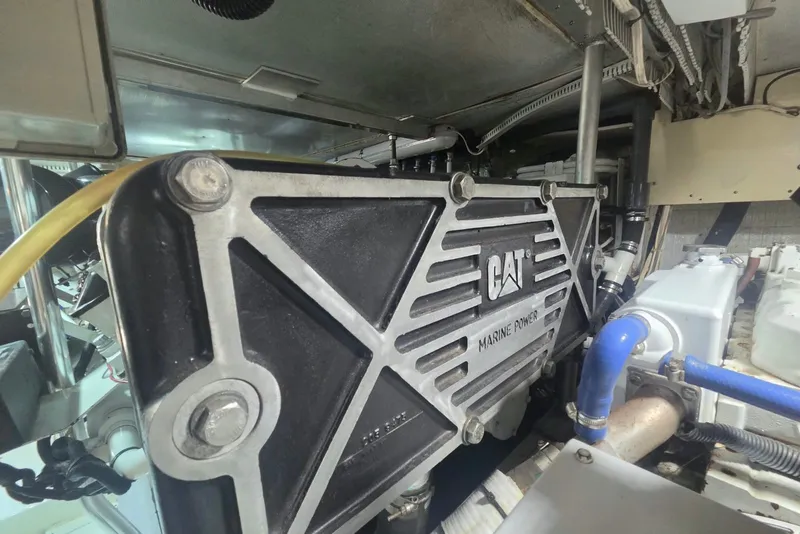 Slide: The Image of Engine room of 1984 Bertram 54 Convertible with CAT marine power unit. - 122