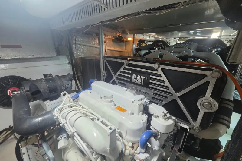 Slide: The Image of Engine room of a 1984 Bertram 54 Convertible with CAT marine engine. - 123
