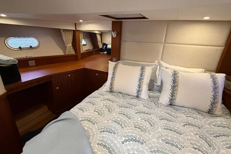 Slide: The Image of Luxurious cabin interior of 2021 Elling E6 yacht with cozy bedding and wooden accents. - 77