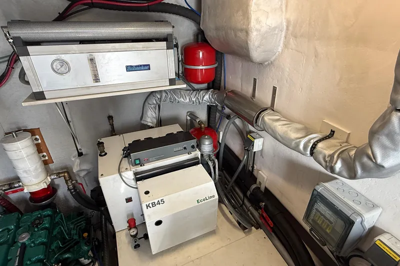 Slide: The Image of Engine room of 2021 Elling E6 yacht with mechanical equipment and piping. - 89