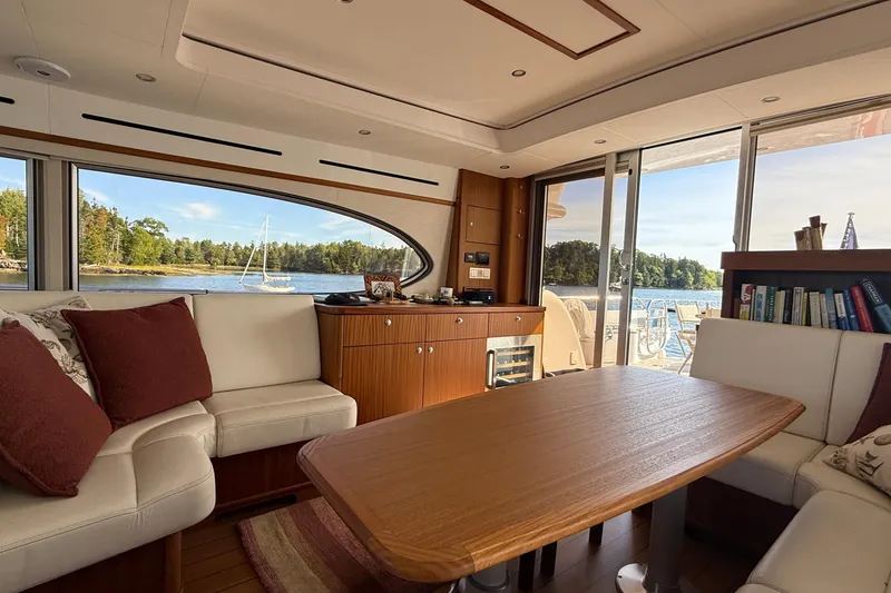 Slide: The Image of Luxurious interior of 2021 Elling E6 yacht with scenic water view through large windows. - 20