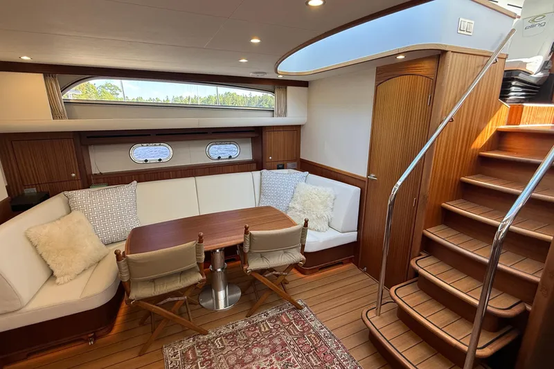Slide: The Image of Luxurious interior of 2021 Elling E6 yacht with elegant seating and wooden finishes. - 36
