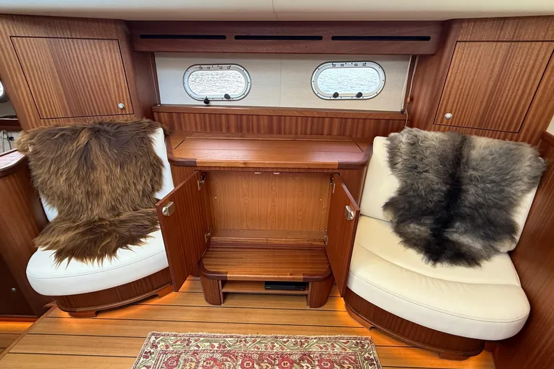 Slide: The Image of Luxurious 2021 Elling E6 yacht interior with plush seating and elegant wood finish. - 41