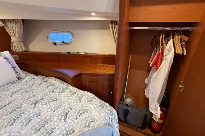 Slide: The Image of Cozy cabin interior of 2021 Elling E6 yacht with bed and wardrobe. - 79
