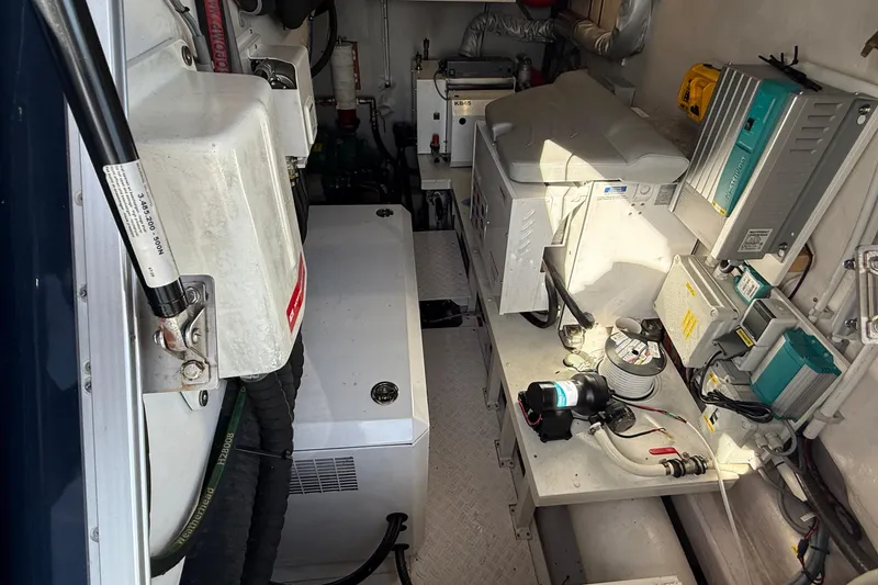 Slide: The Image of Engine room of a 2021 Elling E6 yacht, showcasing equipment and machinery. - 91
