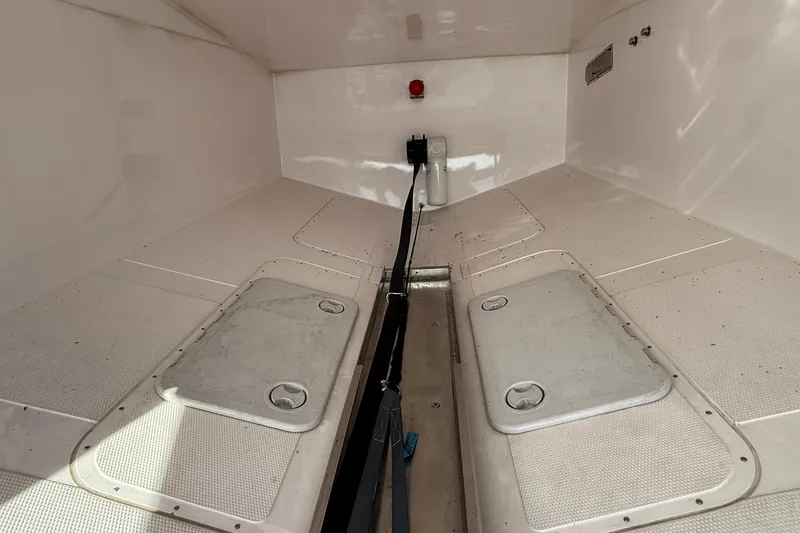 Slide: The Image of Interior view of 2021 Elling E6 boat storage compartment with hatches and clean design. - 98